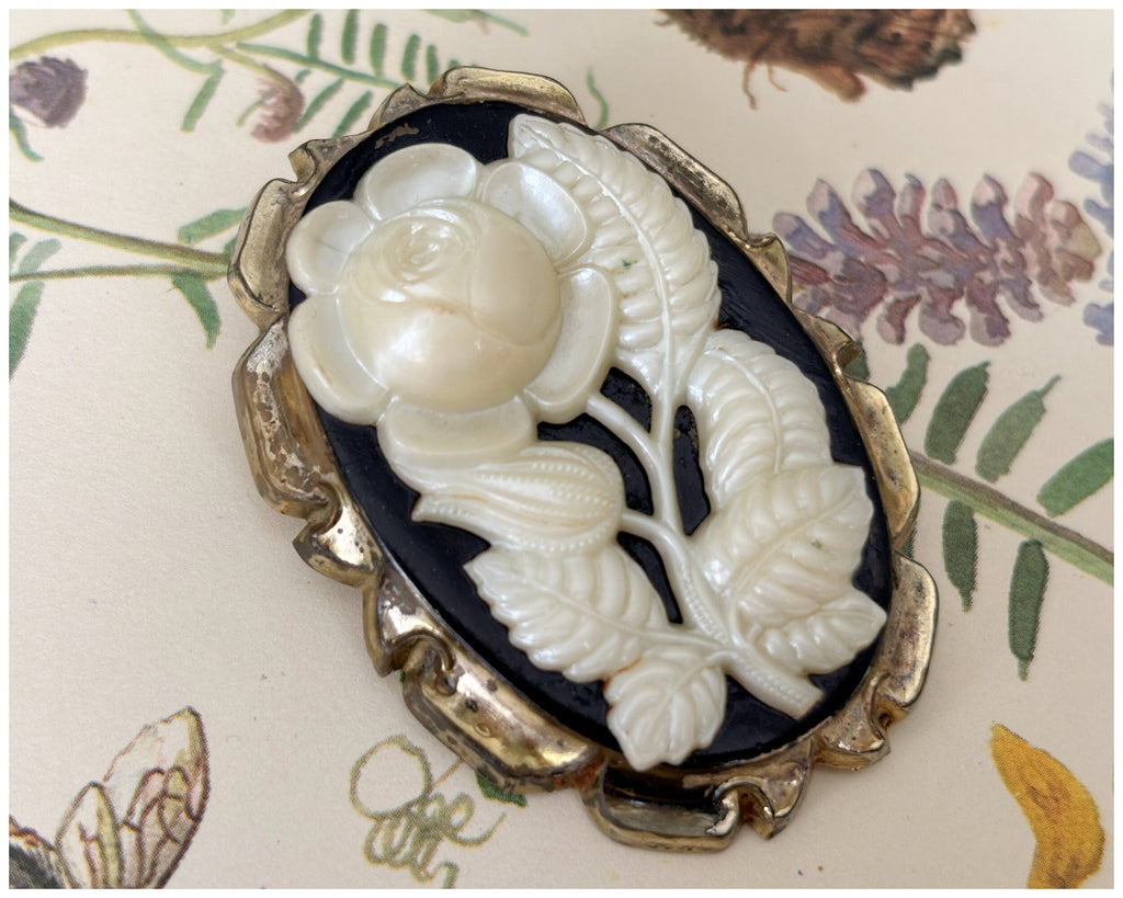 Vintage Early Plastic Moulded Rose Cameo Brooch Black Cream and Gold Celluloid?