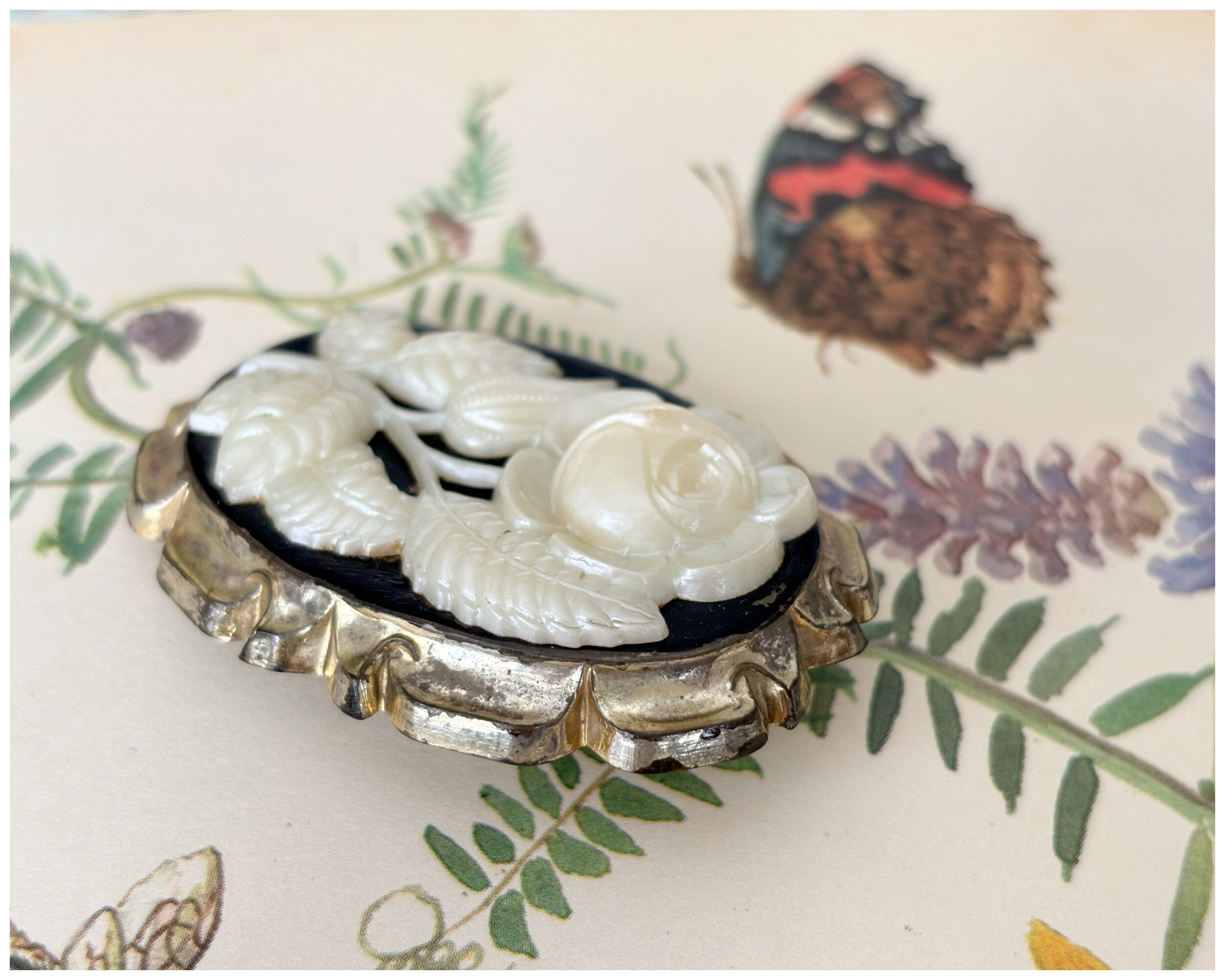 Vintage Early Plastic Moulded Rose Cameo Brooch Black Cream and Gold Celluloid?