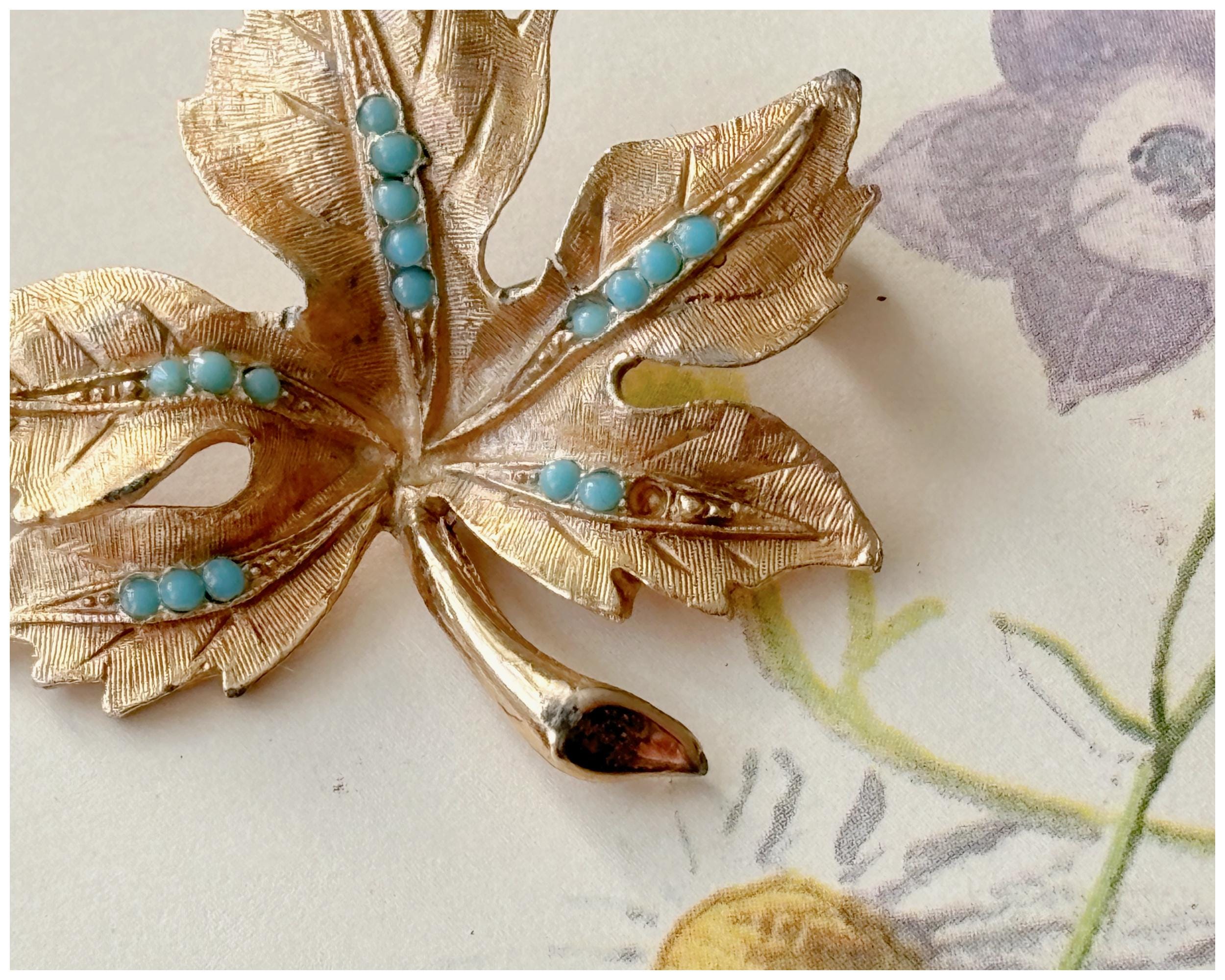 Vintage Gold Toned Autumn Maple Leaf Brooch with Small Turquoise Details by Hollywood