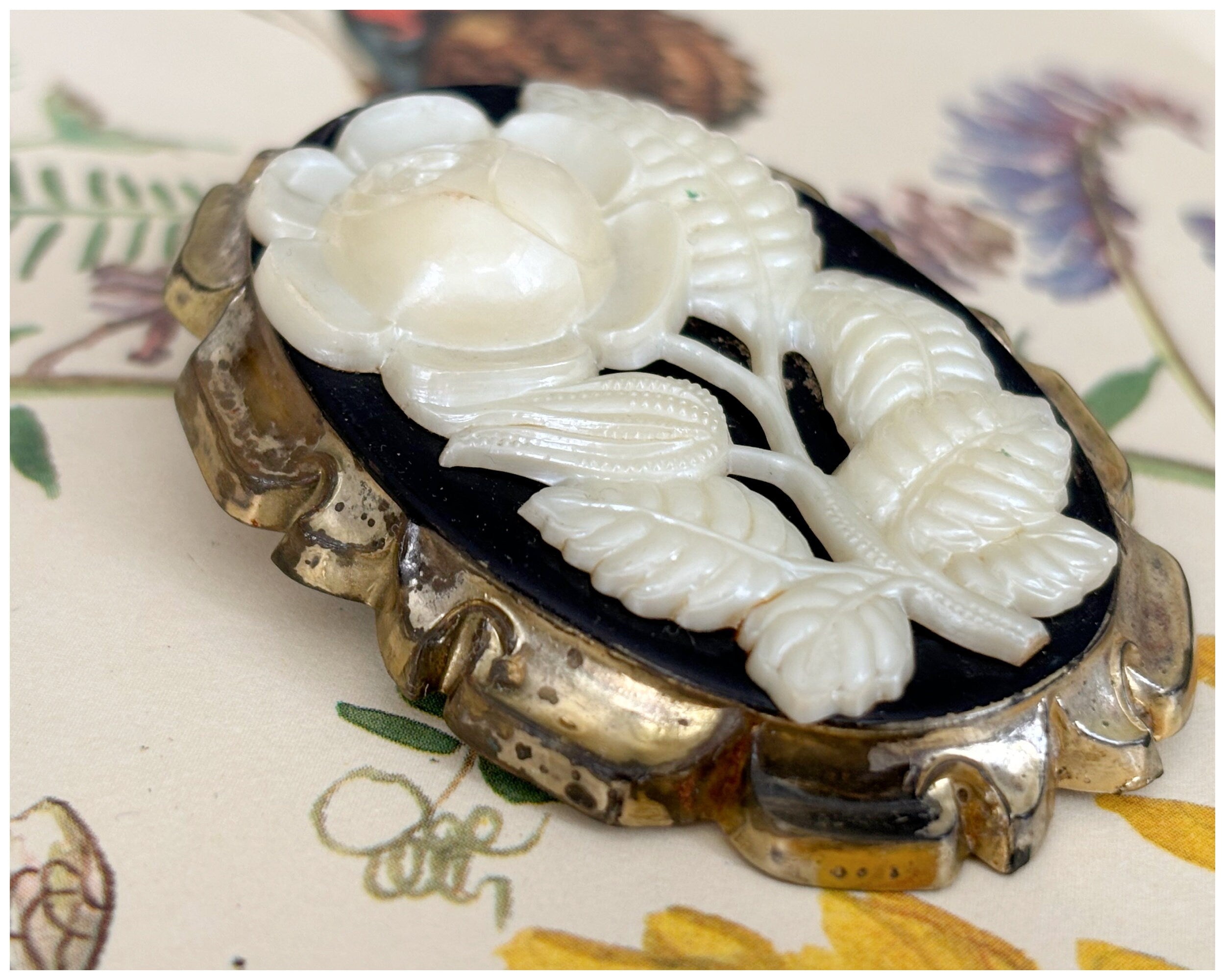 Vintage Early Plastic Moulded Rose Cameo Brooch Black Cream and Gold Celluloid?