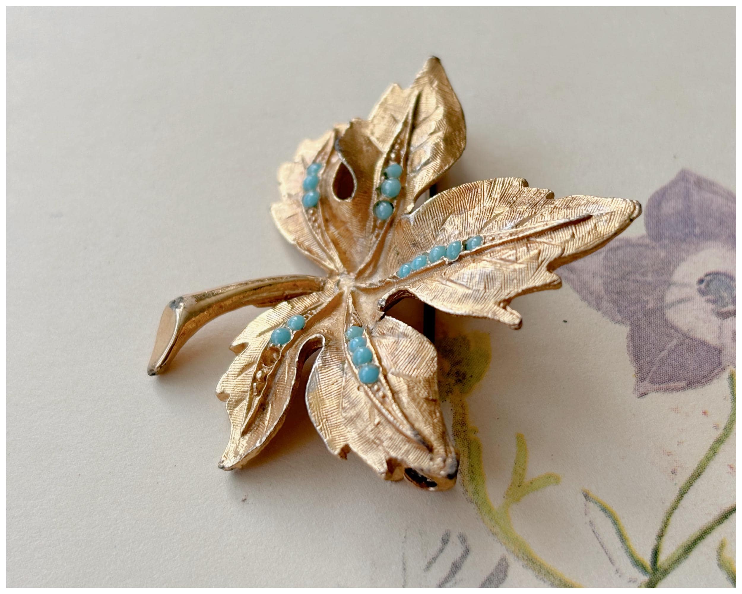 Vintage Gold Toned Autumn Maple Leaf Brooch with Small Turquoise Details by Hollywood